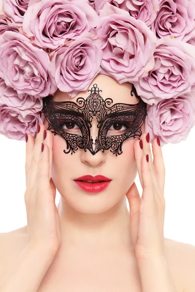 Woman with flower wig and venetian mask — Stock fotografie