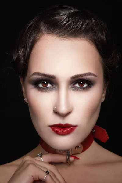 Beautiful woman in red collar — 스톡 사진