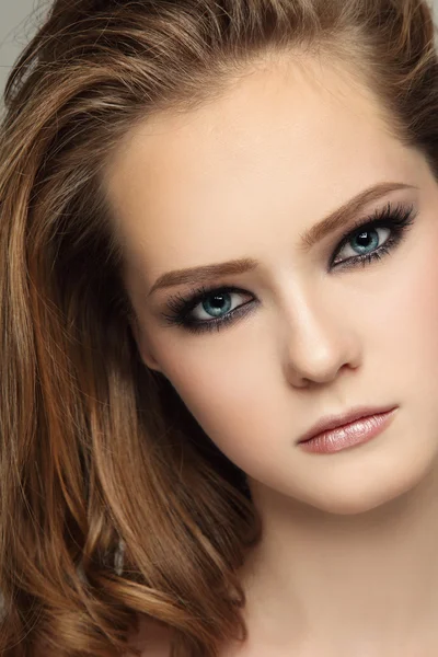 Teen woman with smoky eyes make-up — Stok fotoğraf