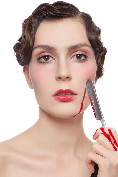 Woman with bloody vintage razor — Zdjęcie stockowe