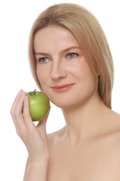 Volwassen vrouw met groene apple — Stockfoto