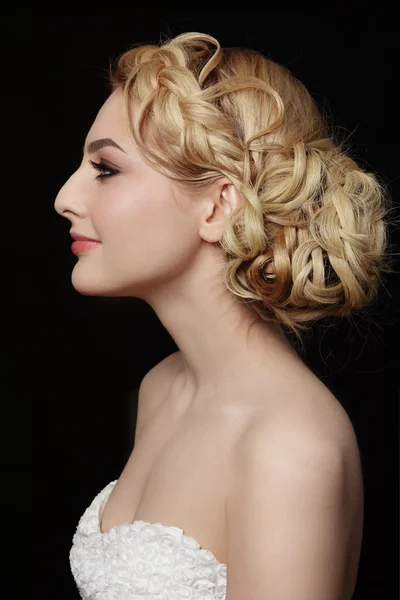 Blonde woman with stylish prom hairdo — Stock Photo, Image