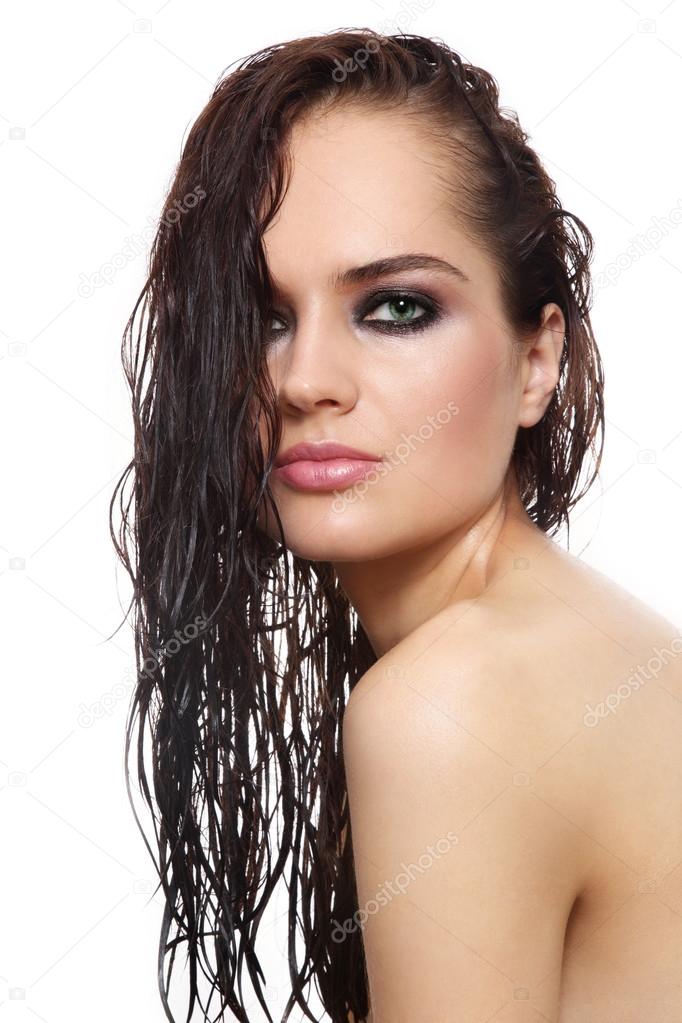 woman with smoky eyes and wet hair