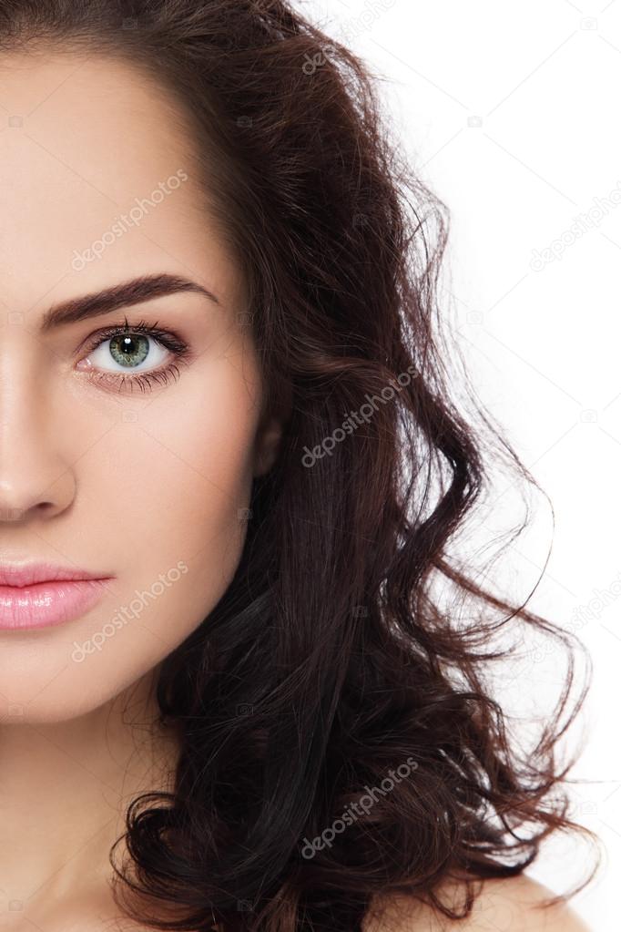 woman with clean make-up and curly hair