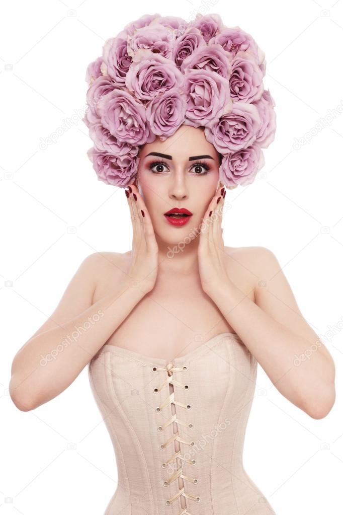 woman in corset with fancy wig of roses