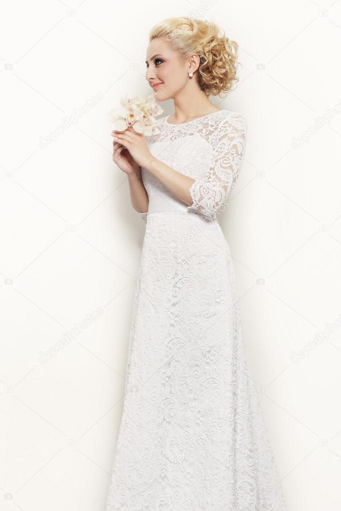 happy smiling bride in lacy dress