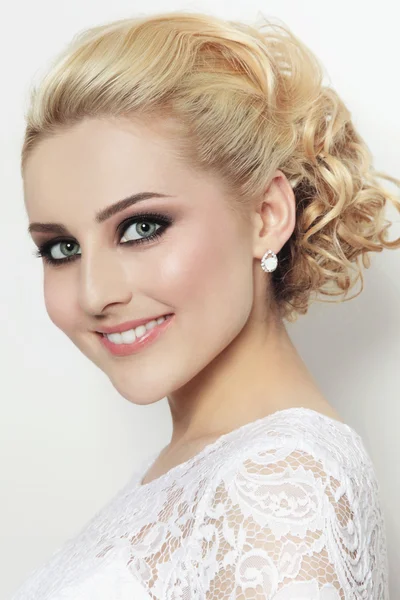 Smiling bride in lacy dress — Stock Photo, Image