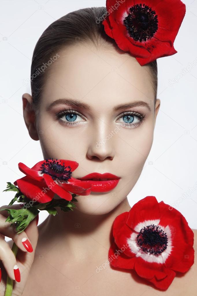 beautiful woman with red flowers