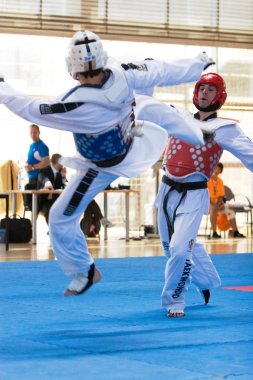 Yarışmacılar Taekwondo yarışmaya katılmak