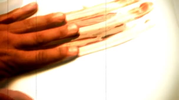 Blutige Hand mit Filmeffekt — Stockvideo