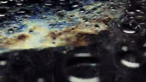 Bubbles in dark water — Stock Video