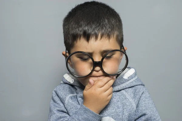 Student with big glasses thinking — Stock Photo, Image