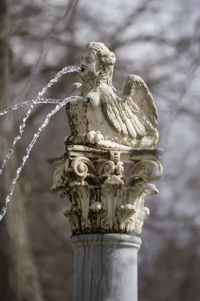 Fountain shaped in figure of angel — Stock Photo, Image