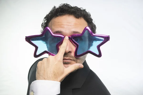 Hombre de negocios con gafas estrellas, loco y divertido triunfador —  Fotos de Stock