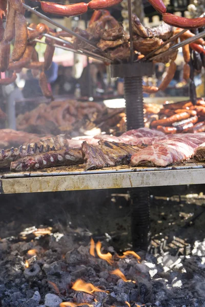 Steak, medieval barbecue with sausages, octopus, meat, ribs and — Stock Photo, Image