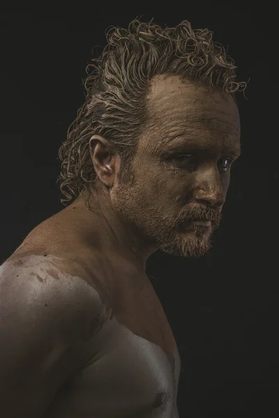 Man covered with mud — Stock Photo, Image