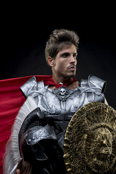 centurion or Roman warrior with iron armor, military helmet with