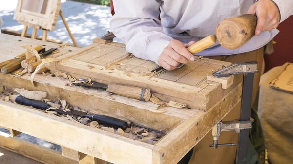 Craftsman carving wood — Stock Photo, Image