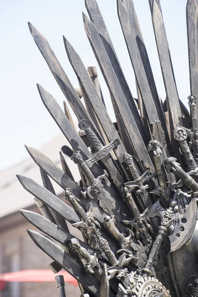 Knight, royal throne made of iron swords, seat of the king, symb — Stock Photo, Image