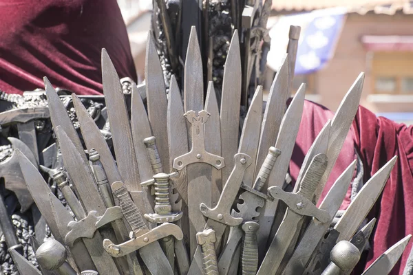 Royal throne made of iron swords, seat of the king, symbol of po — Stock Photo, Image