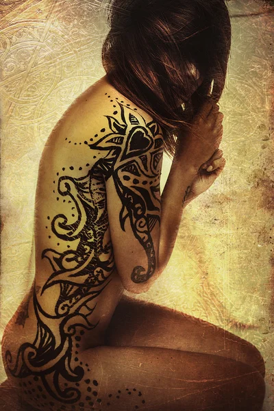 Young, naked woman with black bodyart — Stock Photo, Image