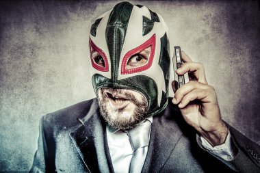 Businessman with mexican wrestler mask clipart
