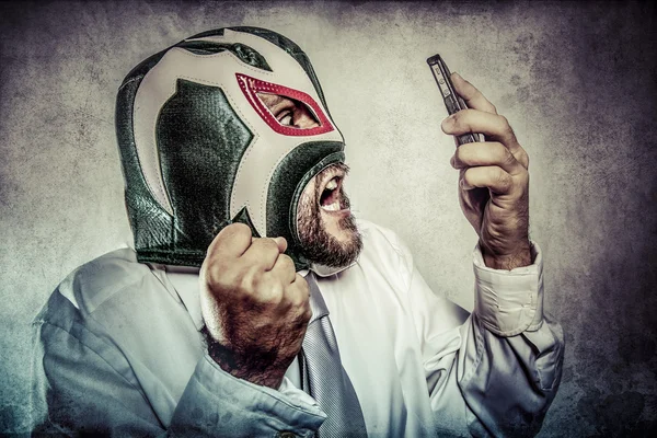 Biznesmen z maską meksykański zapaśnik — Zdjęcie stockowe