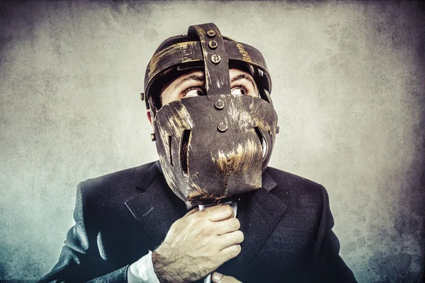 Homem de negócios perigoso com máscara de ferro — Fotografia de Stock