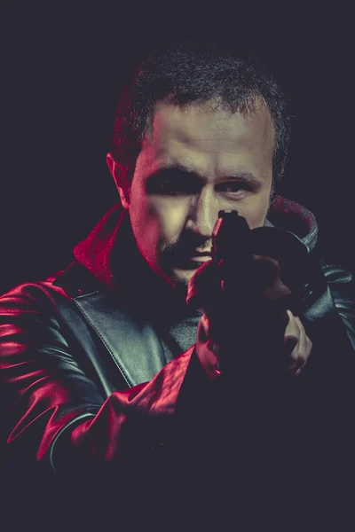 Man with a gun — Stock Photo, Image