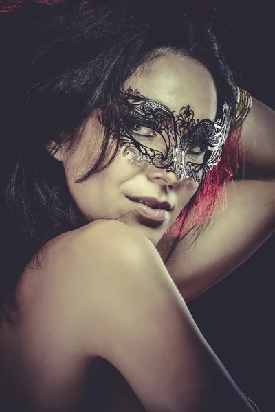 Brunette with venetian mask — Stock Photo, Image