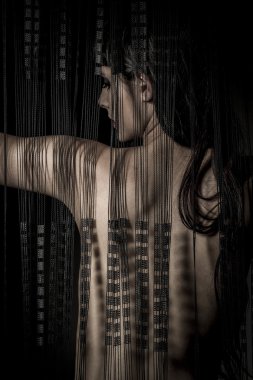 Erotica nude woman back through a curtain wire clipart