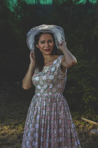 Mature girl gardening in her backyard. — Stock Photo, Image