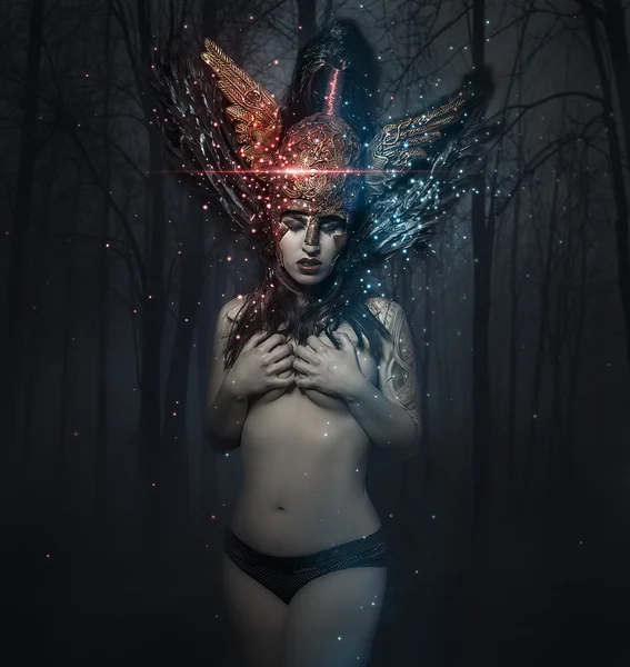 Naked woman in abstract helmet — Stok fotoğraf