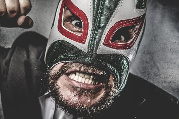 Businessman angry with Mexican wrestler mask — Stock Photo, Image