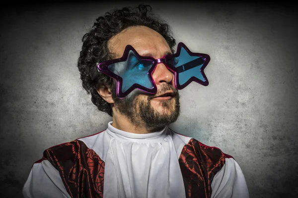 Curly hair man in star-spectacles — Stock Photo, Image