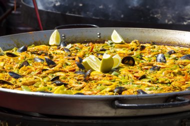 Hot paella with on metal plate