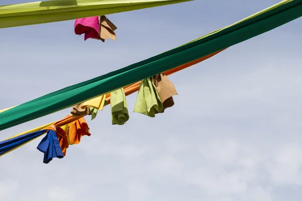 Colorful tapes on pole — Stock Photo, Image