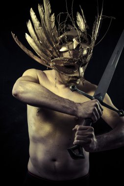 Warrior with helmet and sword