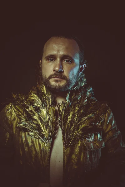 Man with golden jacket — Stockfoto