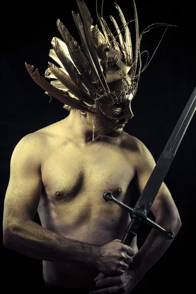 Warrior with helmet and sword — Stock Photo, Image