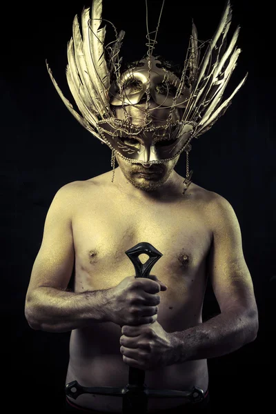 Warrior with helmet and sword — Stock Photo, Image