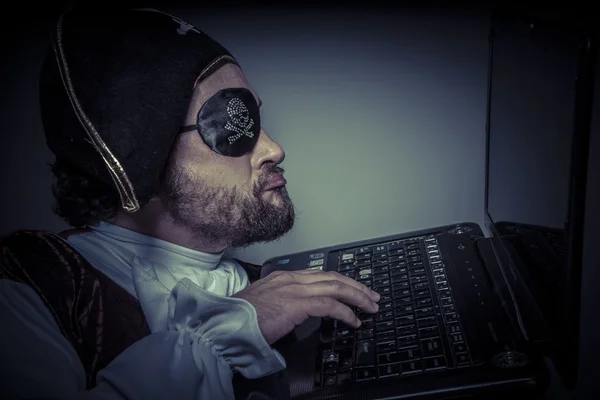 Computer security with hacker pirate — Stock Photo, Image