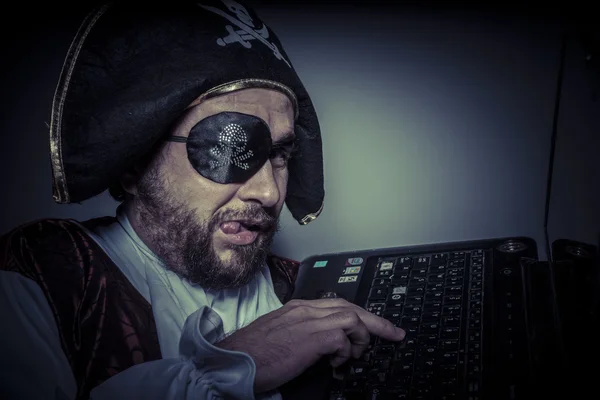 Computer security with hacker pirate — Stock Photo, Image