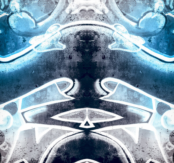 geometric shapes painted on an old concrete wall