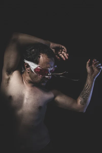 Naked man with blindfold and forks — Stock Photo, Image