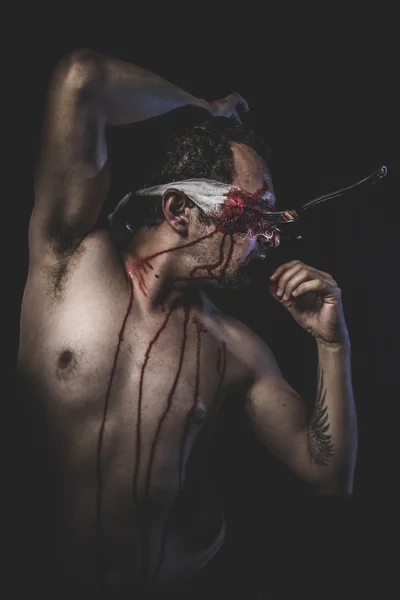 Naked man with blindfold and forks — Stock Photo, Image