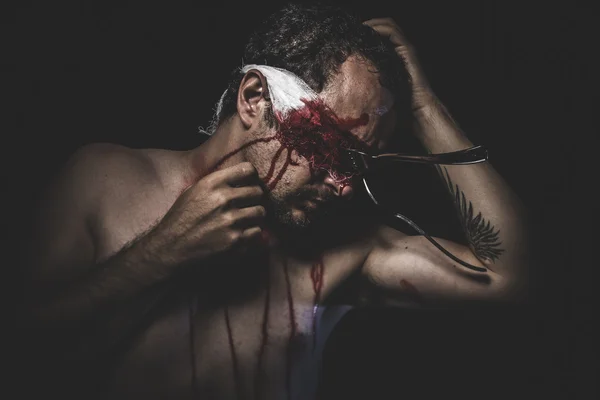 Naked man with blindfold and forks — Stock Photo, Image