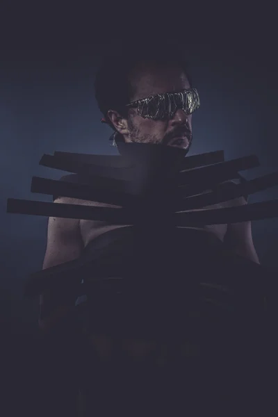 Man in suit made with black strips — Stock Photo, Image