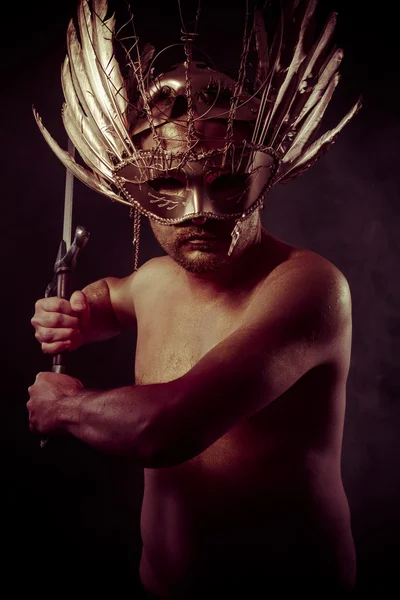 Warrior with golden mask — Stock Photo, Image