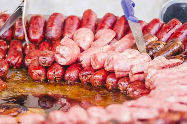 Sausages in a medieval fair — Stock Photo, Image